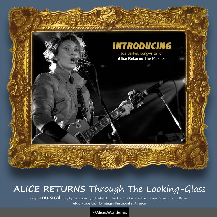 We see a mellow dark blue wall with a thick ornamental gold picture frame hanging from it; within the frame is the black and white photo of singer songwriter, Ida Barker performing live at The Boardwalk, Sheffield (photo of Ida by IDPphotography; this picture is promoting original musical, "Alice Returns Through The Looking-Glass"; story by Zizzi Bonah; music and lyrics by Ida Barker